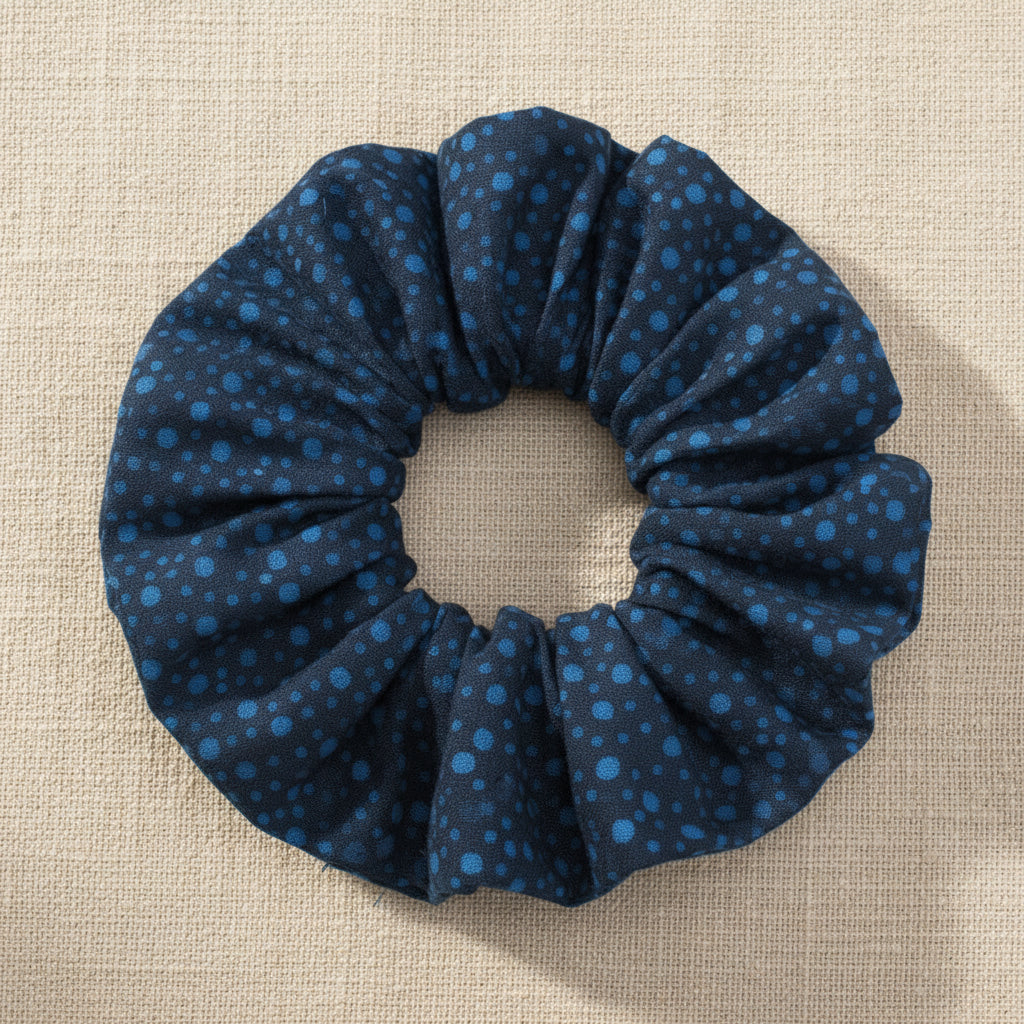 Navy speckled dot handmade cotton scrunchie flat lay
