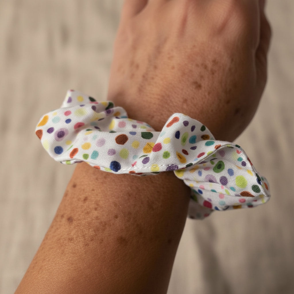 Colorful Spots handmade scrunchie on wrist
