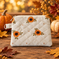 Tiny Sunflower Coin Pouch in a warm fall setting